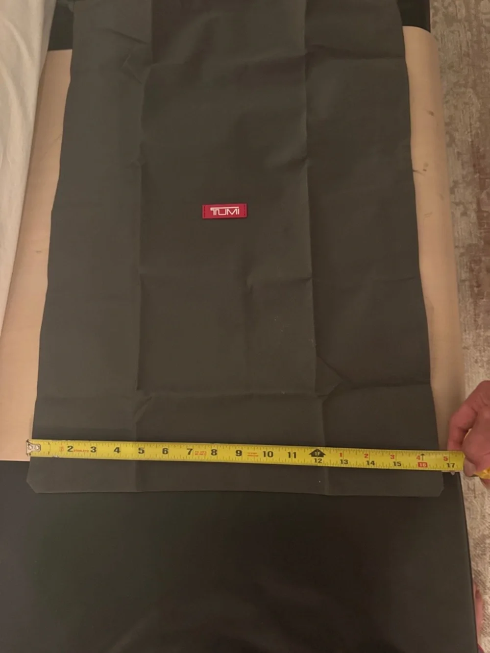Tumi Black Dust Cover with Red Logo Patch